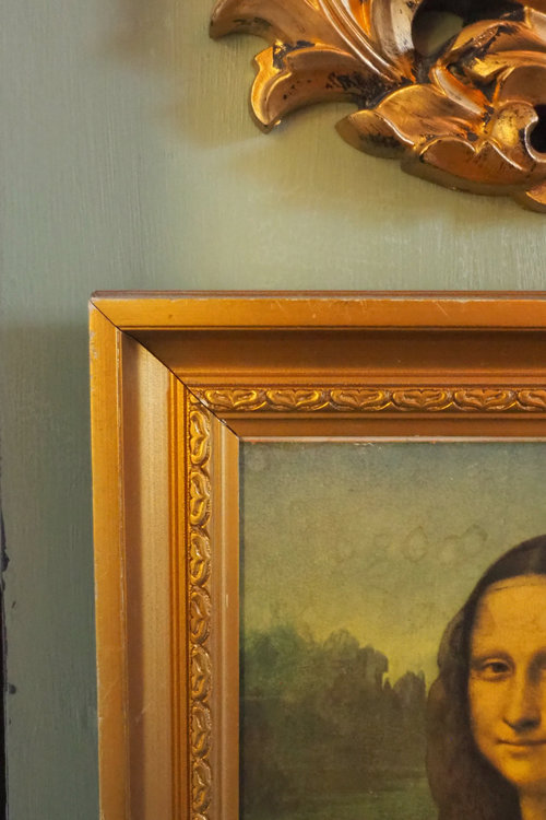 Vintage wall art with golden frames