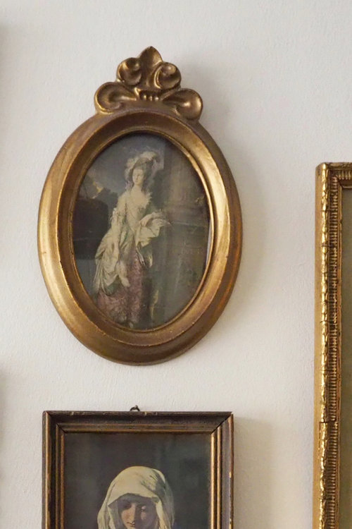 Vintage wall art with golden frames