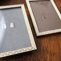 Set of two vintage brass photo frames | Brass and white photo frames 7x10 cm | Vintage Danish picture frames | Vintage frame set