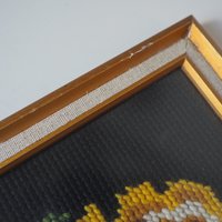 vintage needlepoint wall art with yellow roses