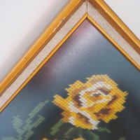 vintage needlepoint wall art with yellow roses