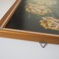 vintage needlepoint wall art with yellow roses