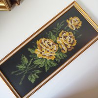 vintage needlepoint wall art with yellow roses