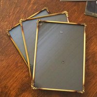 Set of three vintage brass photo frames | Brass photo frames 13x18 cm | Vintage brass picture frames | Vintage floral frames