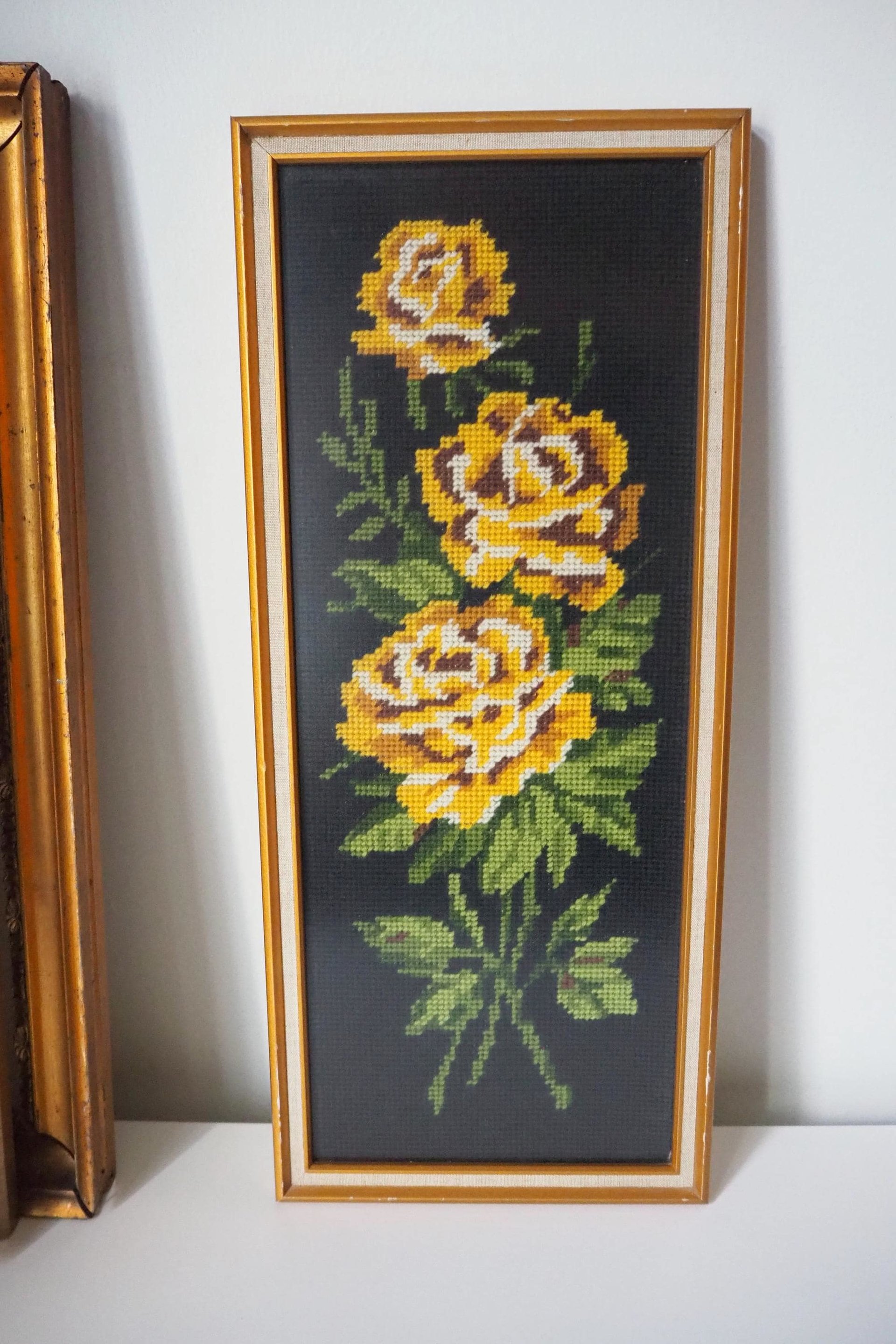 vintage needlepoint wall art with yellow roses