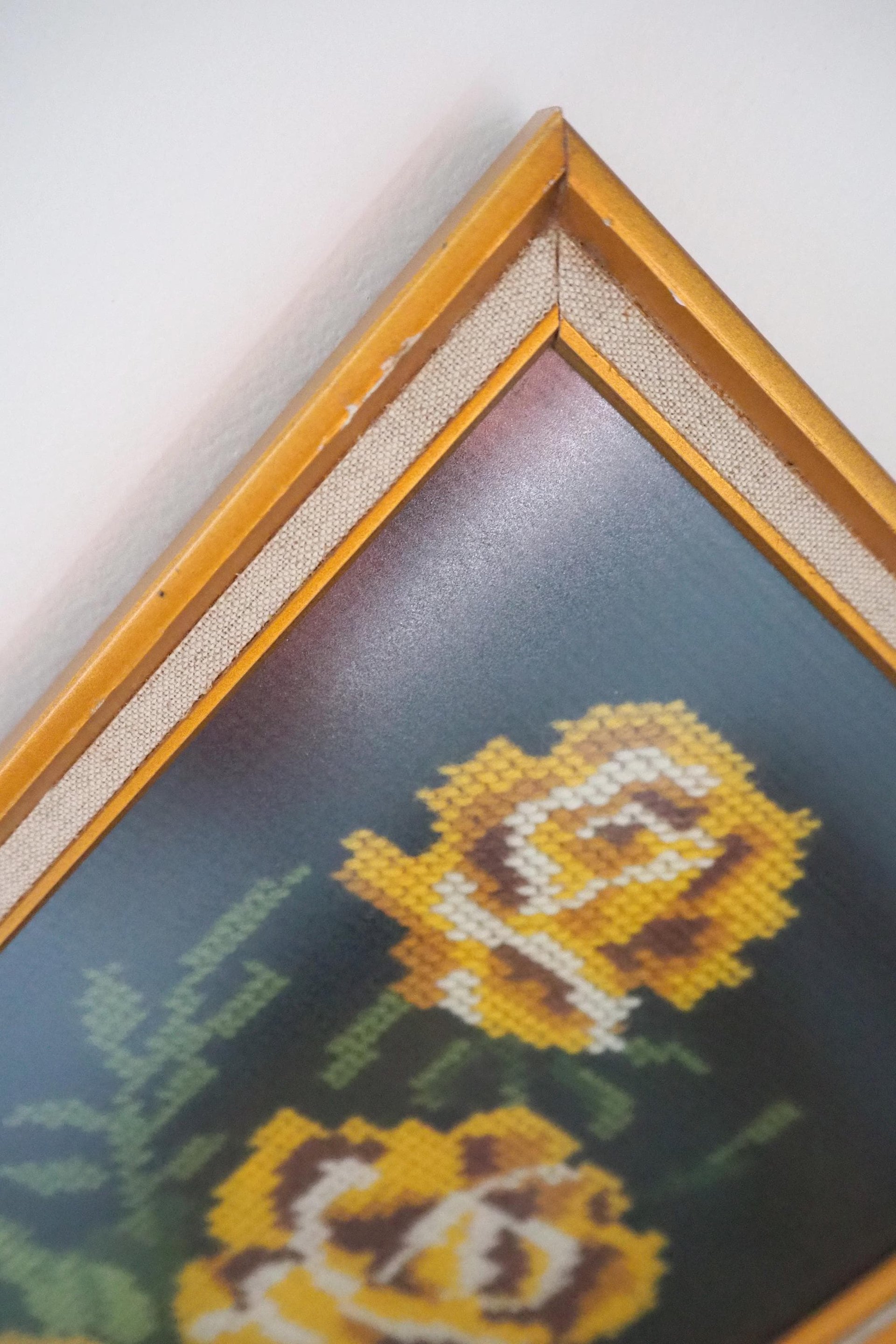 vintage needlepoint wall art with yellow roses