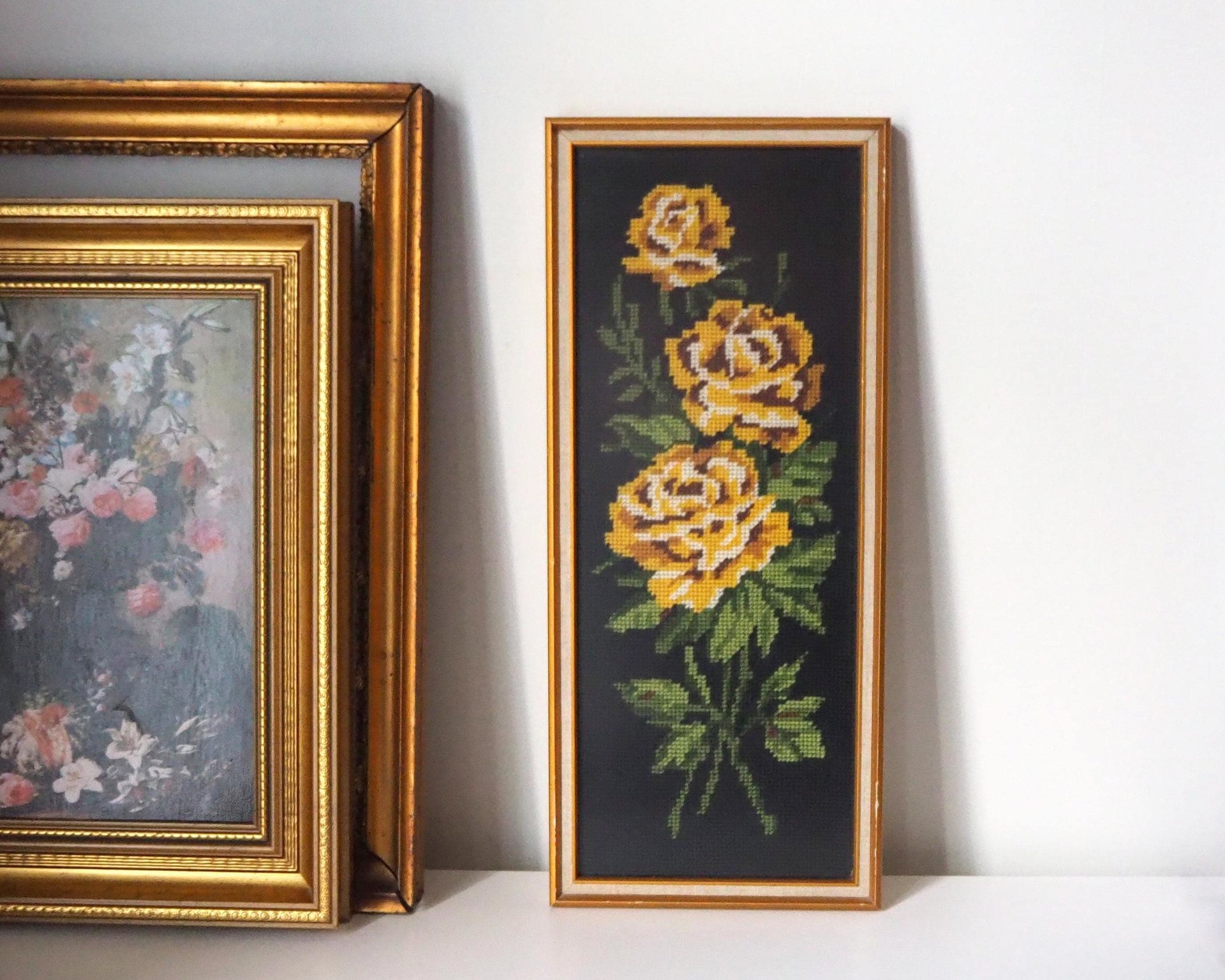 vintage needlepoint wall art with yellow roses