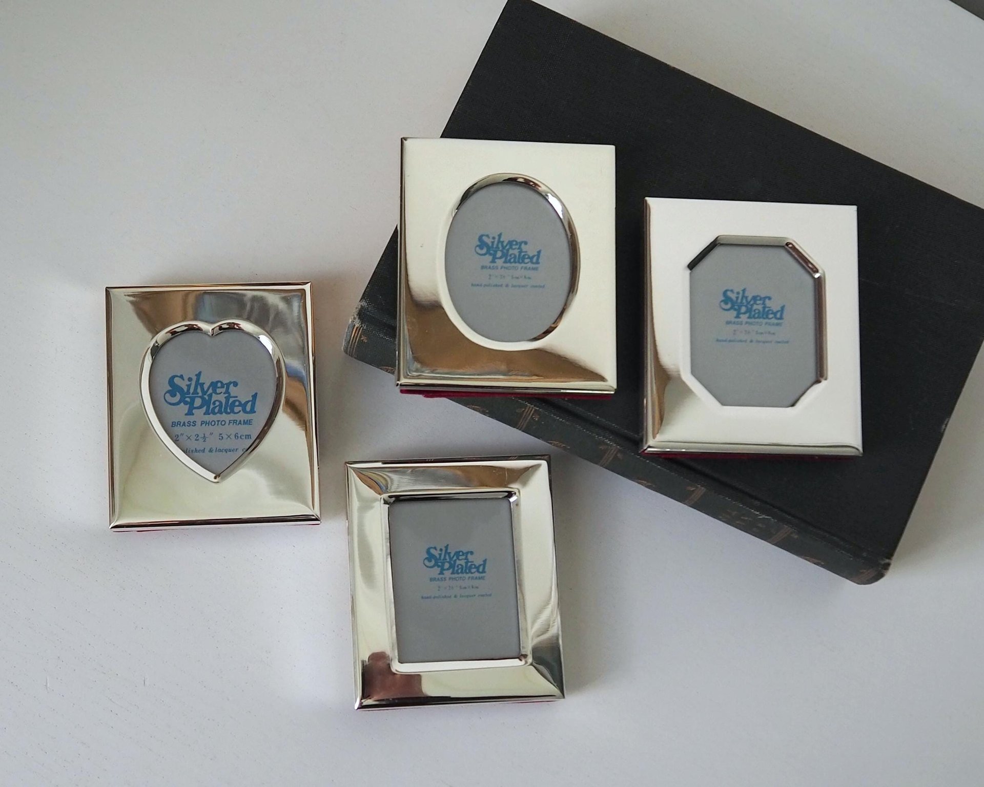 Vintage picture frames | Set of four silver plated frames | Silver plated picture frames | Tiny vintage picture frames