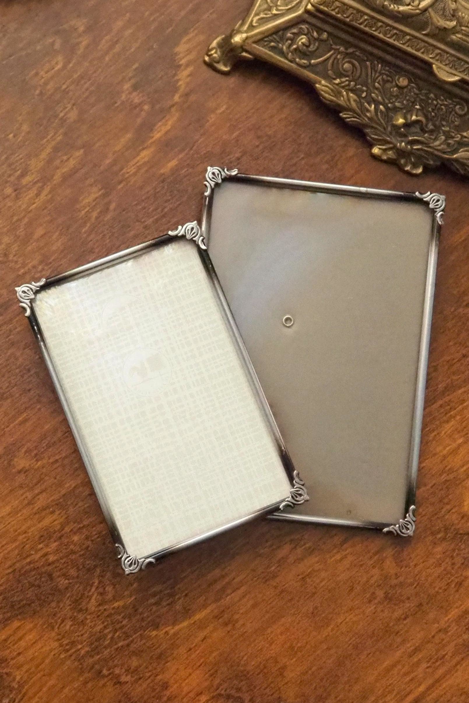 Set of two vintage silver plated photo frames | Silver plated photo frames 9x14 cm and 12x17 cm | Vintage picture frames | Matching frames