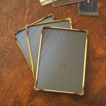 Set of three vintage brass photo frames | Brass photo frames 13x18 cm | Vintage brass picture frames | Vintage floral frames